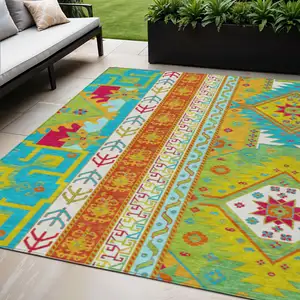 Photo of Teal Blue Green And Pink Aztec Washable Indoor Outdoor Area Rug