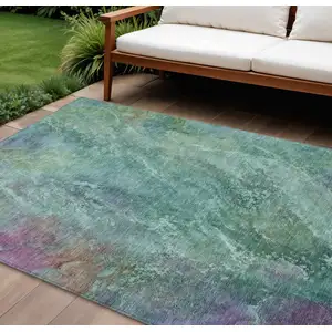 Photo of Teal Blue Green And Purple Abstract Washable Indoor Outdoor Area Rug