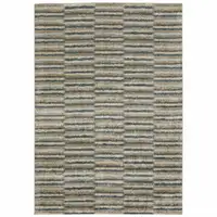 Photo of Teal Blue Grey And Tan Geometric Power Loom Stain Resistant Area Rug