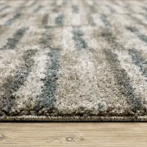 Photo of Teal Blue Grey And Tan Geometric Power Loom Stain Resistant Area Rug