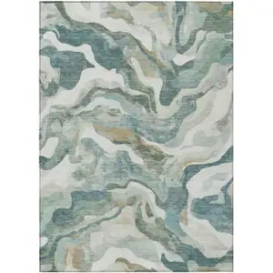 Photo of Teal Blue Ivory And Beige Abstract Washable Indoor Outdoor Area Rug
