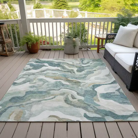 Teal Blue Ivory And Beige Abstract Washable Indoor Outdoor Area Rug Photo 8