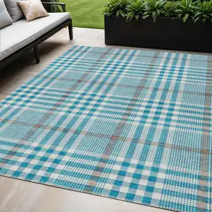 Photo of Teal Blue Ivory And Brown Plaid Washable Indoor Outdoor Area Rug