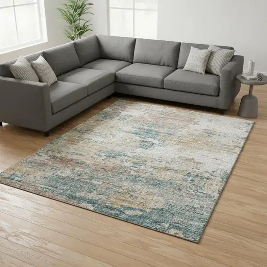 Teal Blue Ivory And Copper Abstract Washable Area Rug With UV Protection Photo 1