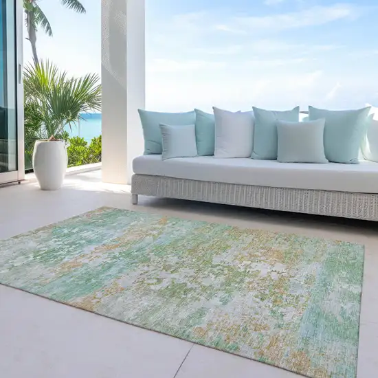 Teal Blue Ivory And Copper Abstract Washable Indoor Outdoor Area Rug Photo 5