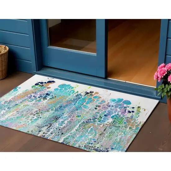 Teal Blue Ivory And Gold Abstract Washable Indoor Outdoor Area Rug Photo 1