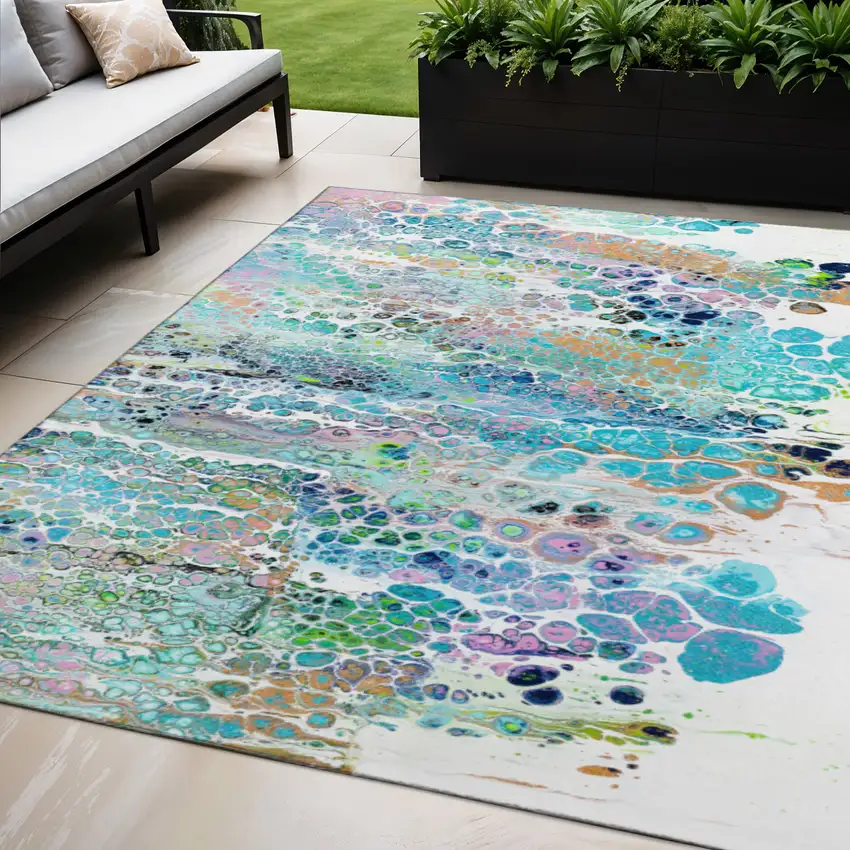 Teal Blue Ivory And Gold Abstract Washable Indoor Outdoor Area Rug Photo 1