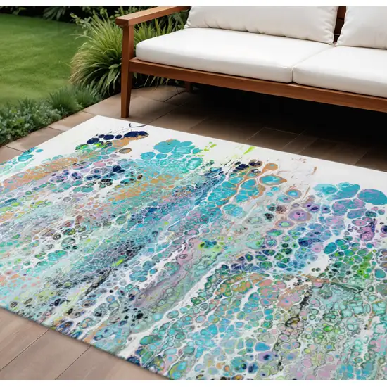 Teal Blue Ivory And Gold Abstract Washable Indoor Outdoor Area Rug Photo 1