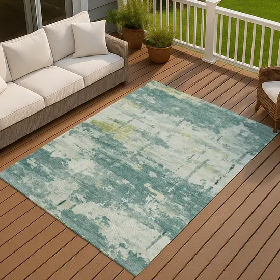 Teal Blue Ivory And Gold Abstract Washable Indoor Outdoor Area Rug Photo 4