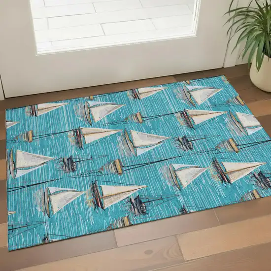 Teal Blue Ivory And Gold Nautical Washable Area Rug With UV Protection Photo 1