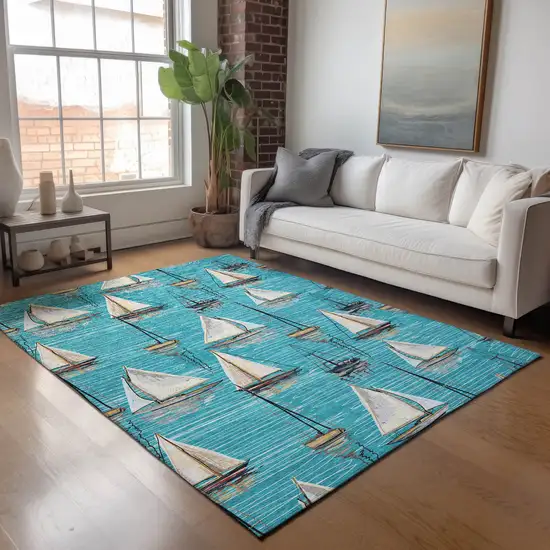 Teal Blue Ivory And Gold Nautical Washable Area Rug With UV Protection Photo 6