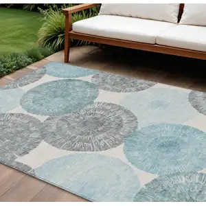 Photo of Teal Blue Ivory And Gray Abstract Washable Indoor Outdoor Area Rug