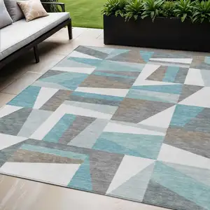 Photo of Teal Blue Ivory And Gray Geometric Washable Indoor Outdoor Area Rug
