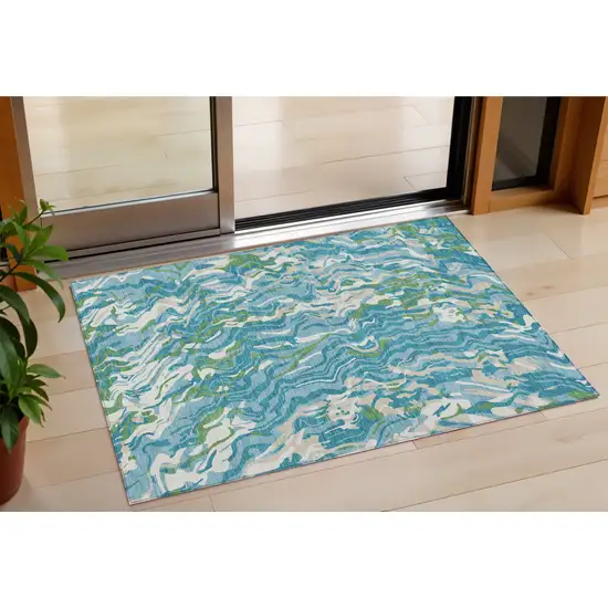 Teal Blue Ivory And Green Abstract Washable Indoor Outdoor Area Rug Photo 1