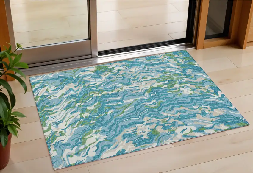 Teal Blue Ivory And Green Abstract Washable Indoor Outdoor Area Rug Photo 1
