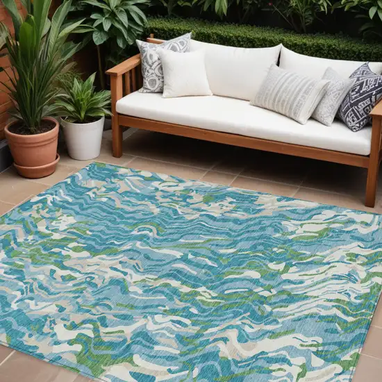 Teal Blue Ivory And Green Abstract Washable Indoor Outdoor Area Rug Photo 1