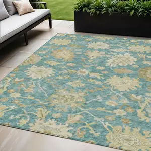 Photo of Teal Blue Ivory And Green Floral Washable Indoor Outdoor Area Rug