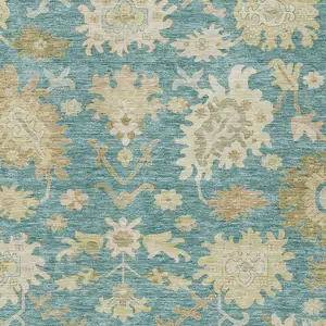 Photo of Teal Blue Ivory And Green Floral Washable Indoor Outdoor Area Rug