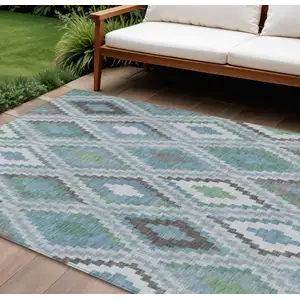 Photo of Teal Blue Ivory And Green Geometric Washable Indoor Outdoor Area Rug