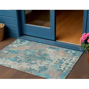 Photo of Teal Blue Ivory And Light Brown Damask Washable Indoor Outdoor Area Rug