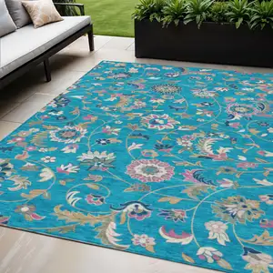 Photo of Teal Blue Ivory And Pink Floral Washable Indoor Outdoor Area Rug