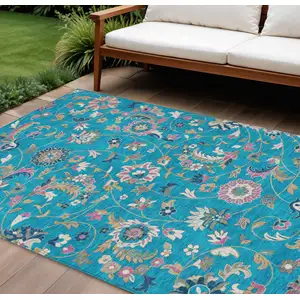 Photo of Teal Blue Ivory And Pink Floral Washable Indoor Outdoor Area Rug