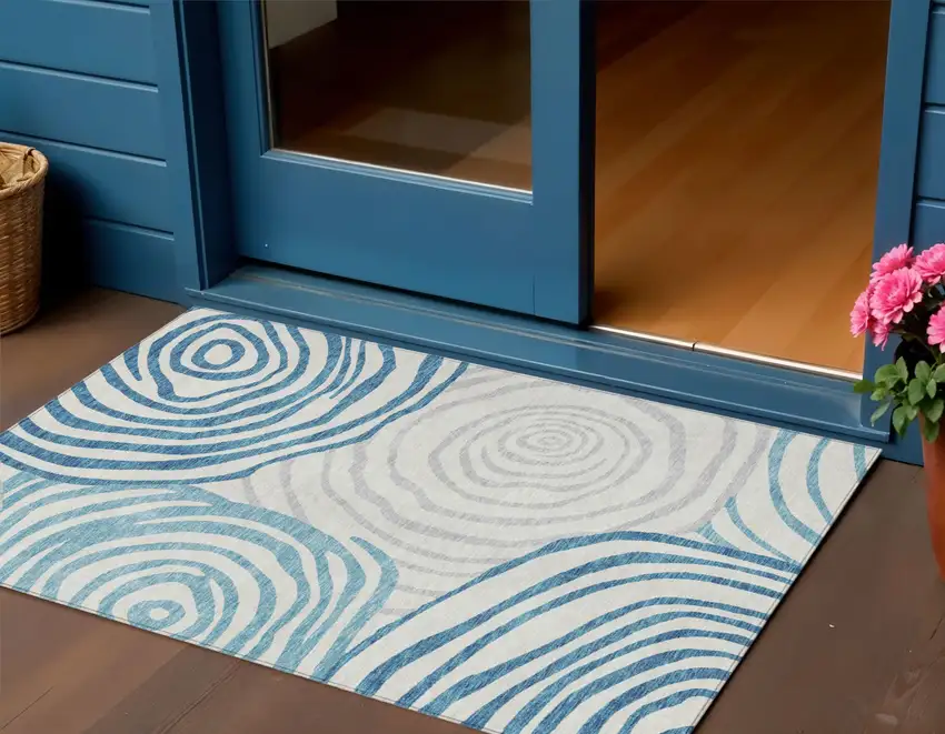 Teal Blue Ivory And Silver Abstract Washable Indoor Outdoor Area Rug Photo 1