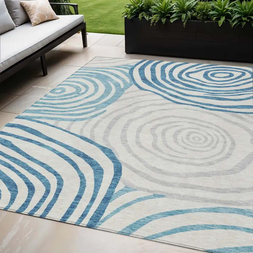 Teal Blue Ivory And Silver Abstract Washable Indoor Outdoor Area Rug Photo 1