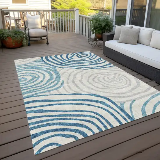 Teal Blue Ivory And Silver Abstract Washable Indoor Outdoor Area Rug Photo 9