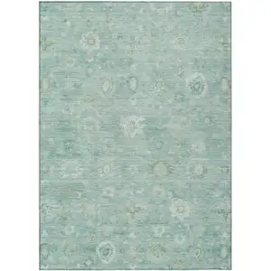 Photo of Teal Blue Ivory And Tan Damask Washable Indoor Outdoor Area Rug