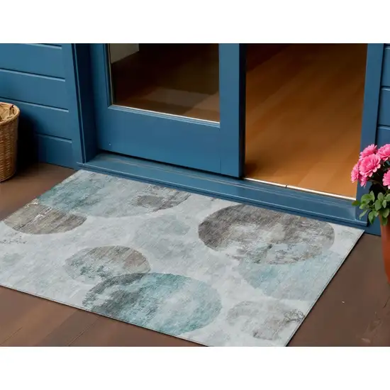 Teal Blue Ivory And Taupe Abstract Washable Indoor Outdoor Area Rug Photo 1
