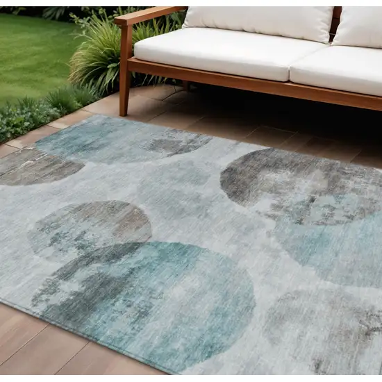 Teal Blue Ivory And Taupe Abstract Washable Indoor Outdoor Area Rug Photo 1