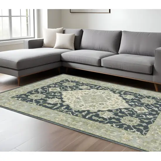 Teal Blue And Ivory Oriental Distressed Area Rug Photo 1