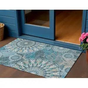 Photo of Teal Blue Khaki And Ivory Paisley Washable Indoor Outdoor Area Rug
