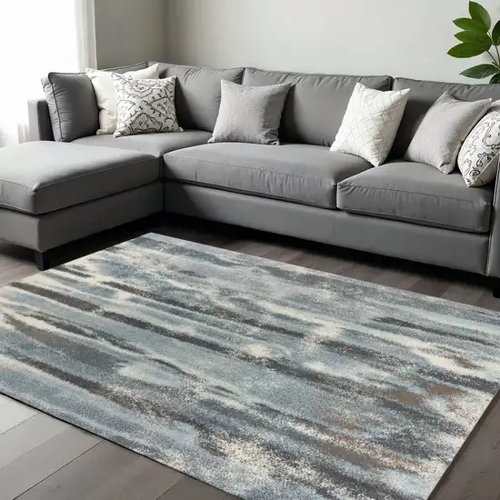 Teal Blue And White Abstract Area Rug Photo 1