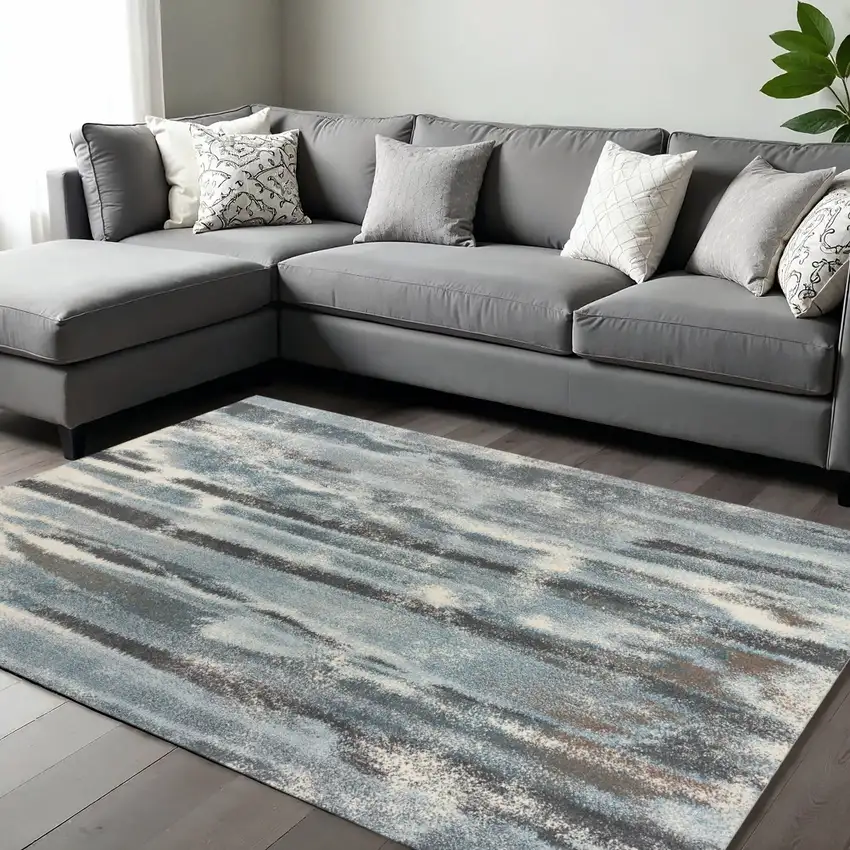Teal Blue And White Abstract Area Rug Photo 1