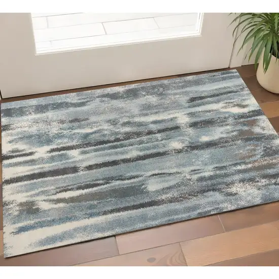 Teal Blue And White Abstract Area Rug Photo 1