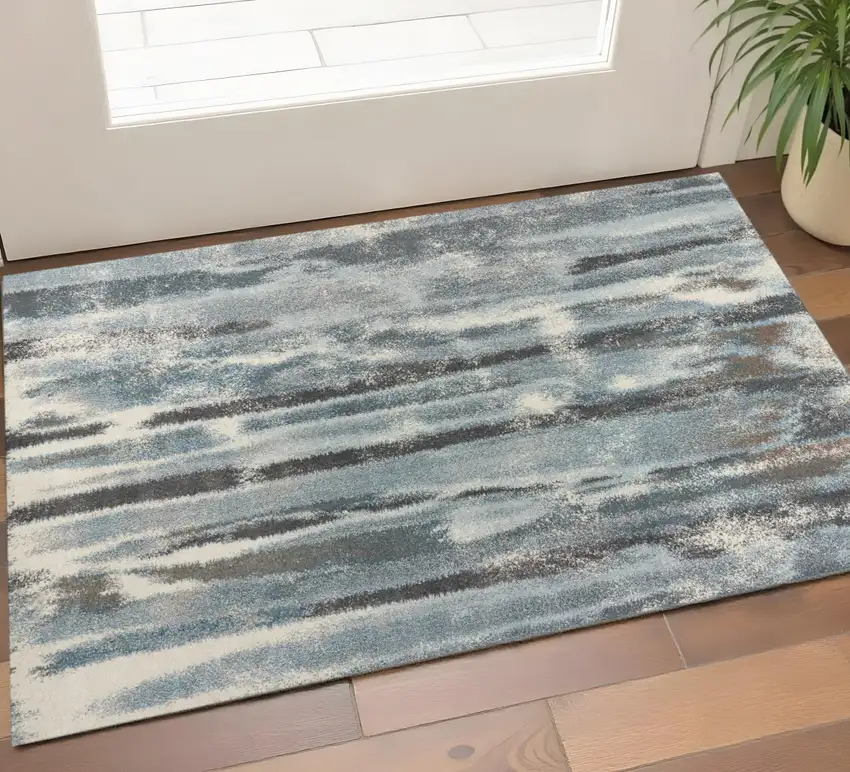 Teal Blue And White Abstract Area Rug Photo 1