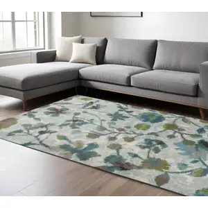 Photo of Teal Blue Machine Woven Floral Indoor Area Rug