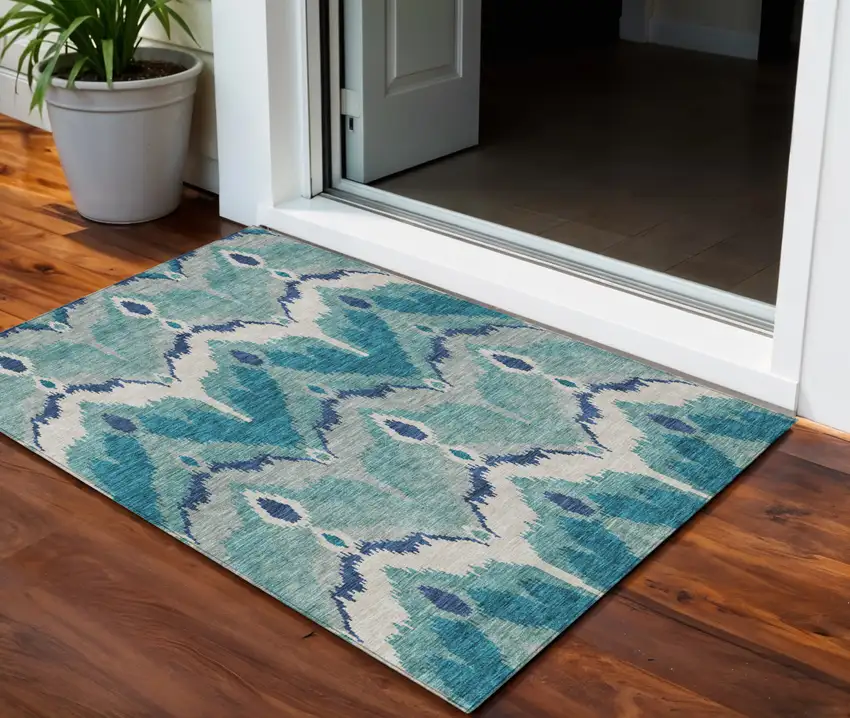 Teal Blue Navy Blue And Ivory Ikat Washable Indoor Outdoor Area Rug Photo 1