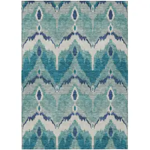 Photo of Teal Blue Navy Blue And Ivory Ikat Washable Indoor Outdoor Area Rug