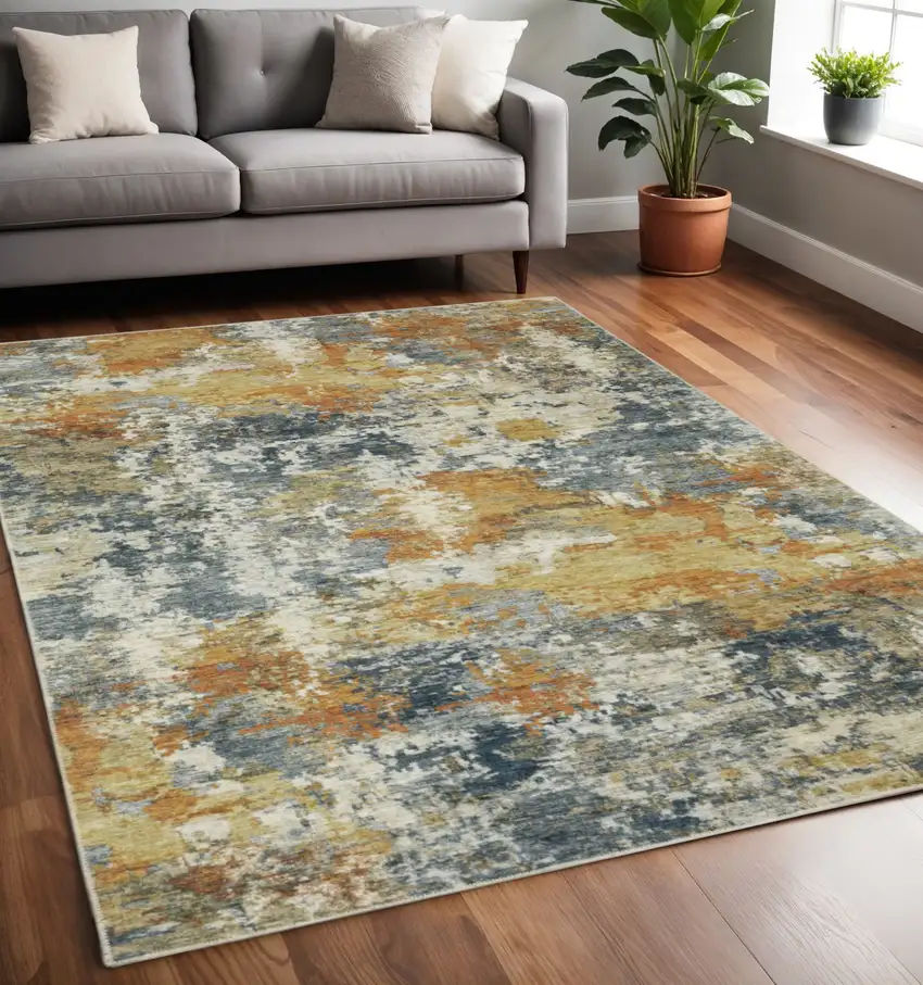 Teal Blue And Gold Abstract Distressed Area Rug Photo 1