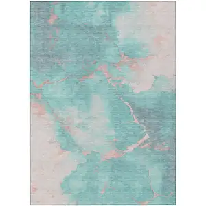 Photo of Teal Blue Peach And Ivory Abstract Washable Indoor Outdoor Area Rug