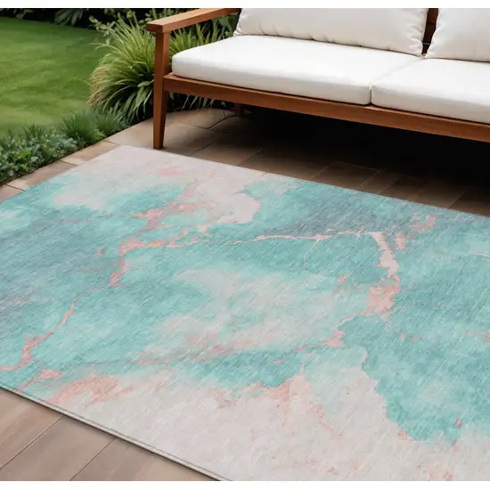 Teal Blue Peach And Ivory Abstract Washable Indoor Outdoor Area Rug Photo 2