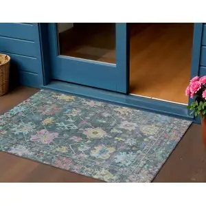 Photo of Teal Blue Pink And Gold Floral Washable Indoor Outdoor Area Rug