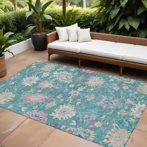 Photo of Teal Blue Pink And Ivory Floral Washable Indoor Outdoor Area Rug