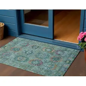 Photo of Teal Blue Purple And Gold Medallion Washable Indoor Outdoor Area Rug