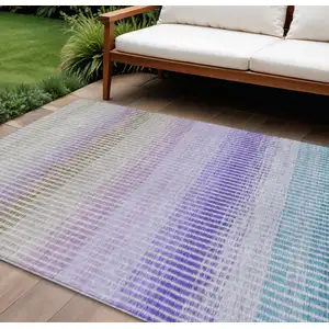 Photo of Teal Blue Purple And Gray Striped Washable Indoor Outdoor Area Rug
