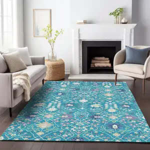 Photo of Teal Blue Purple And Ivory Oriental Washable Indoor Outdoor Area Rug