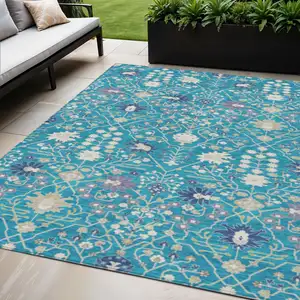 Photo of Teal Blue Purple And Ivory Oriental Washable Indoor Outdoor Area Rug